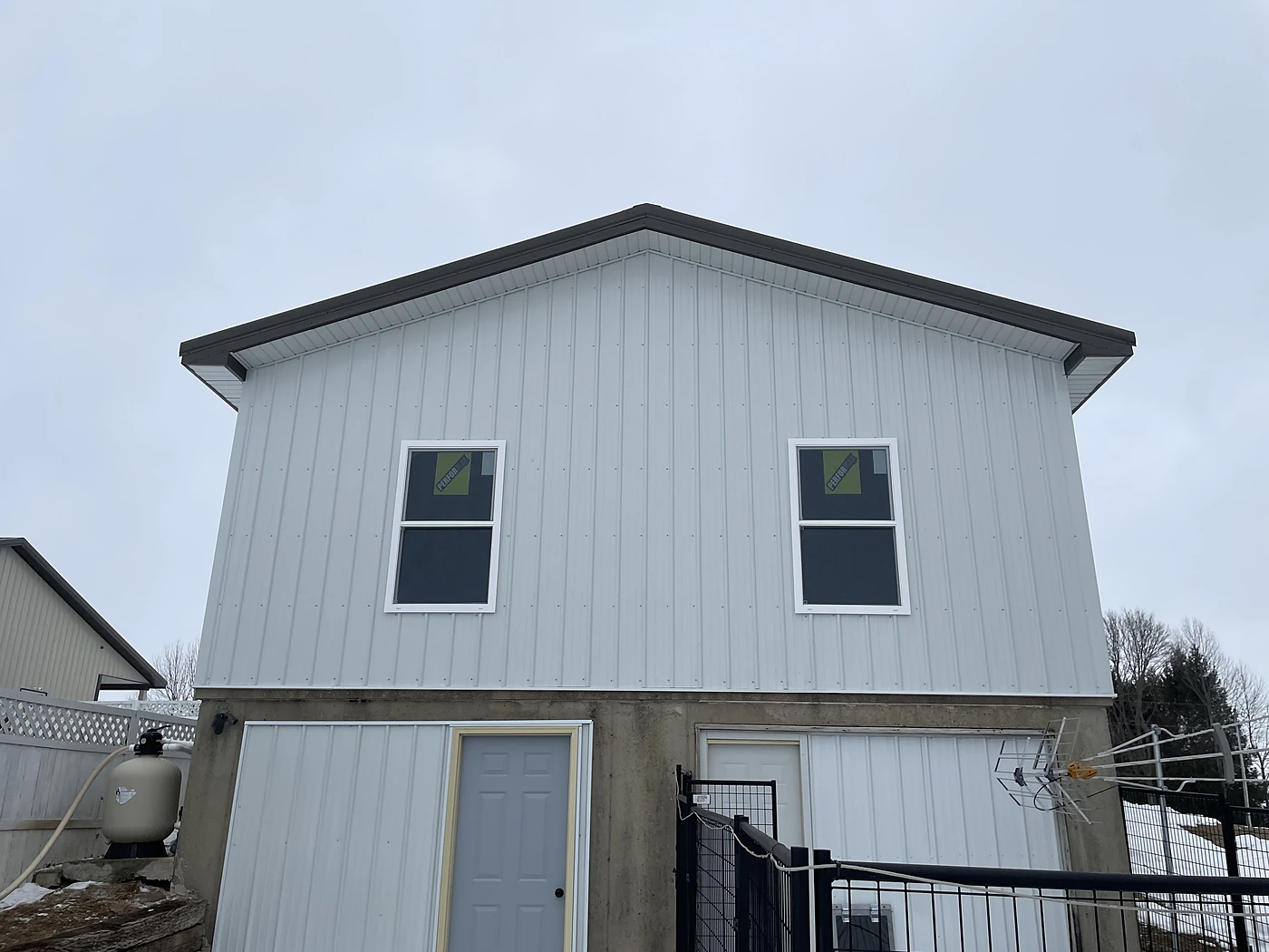 Finished two-story addition with new siding